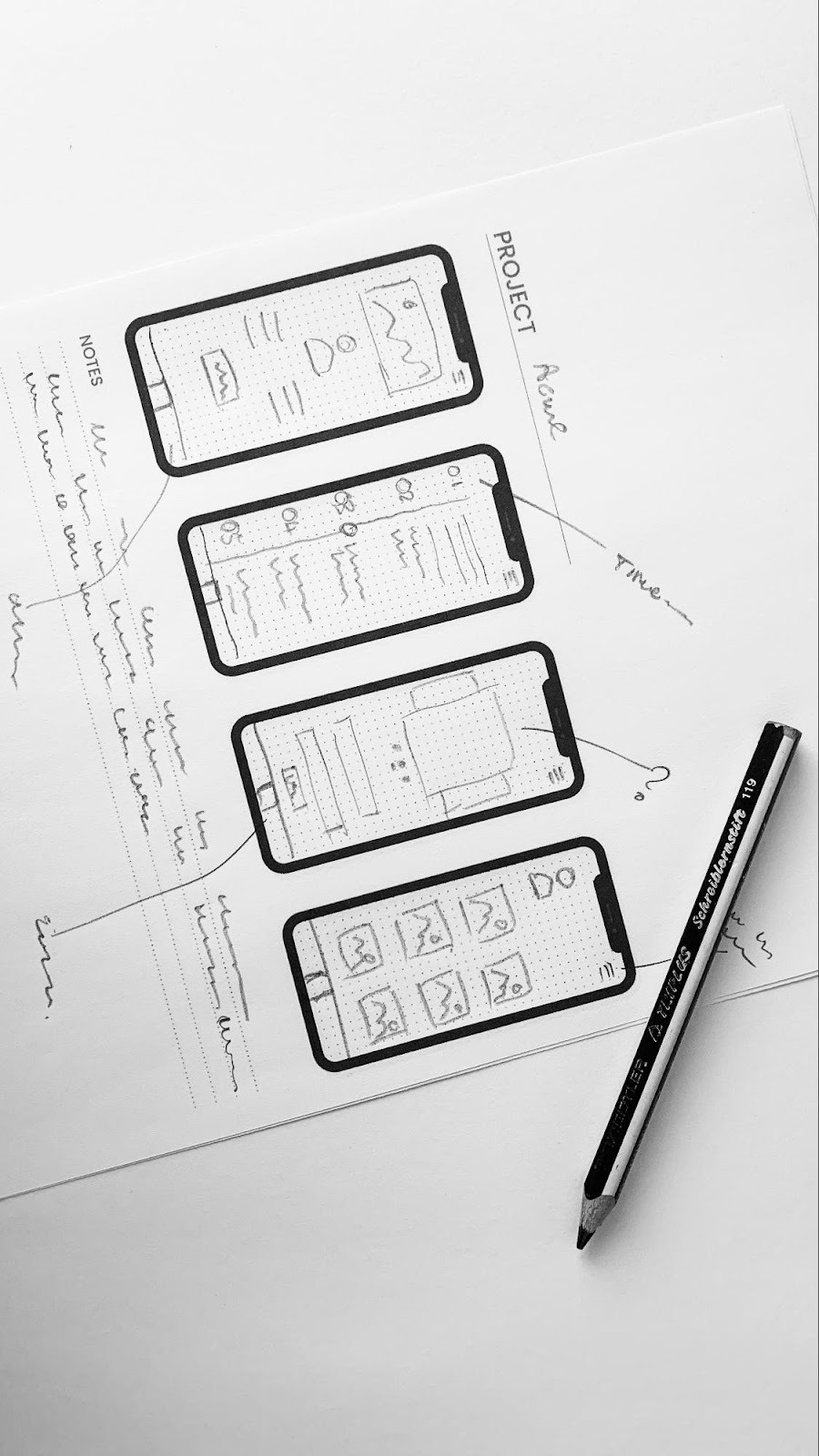 Hand-drawn wireframe sketches for a mobile app, planning the User Interface (UI) and User Experience (UX).