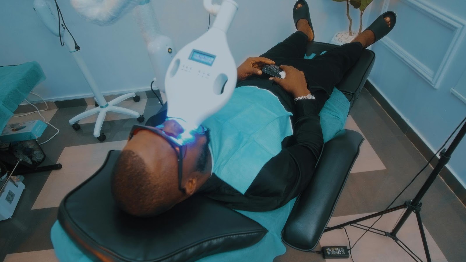 Patient undergoing professional teeth whitening, a popular cosmetic service to highlight in dental marketing campaigns.