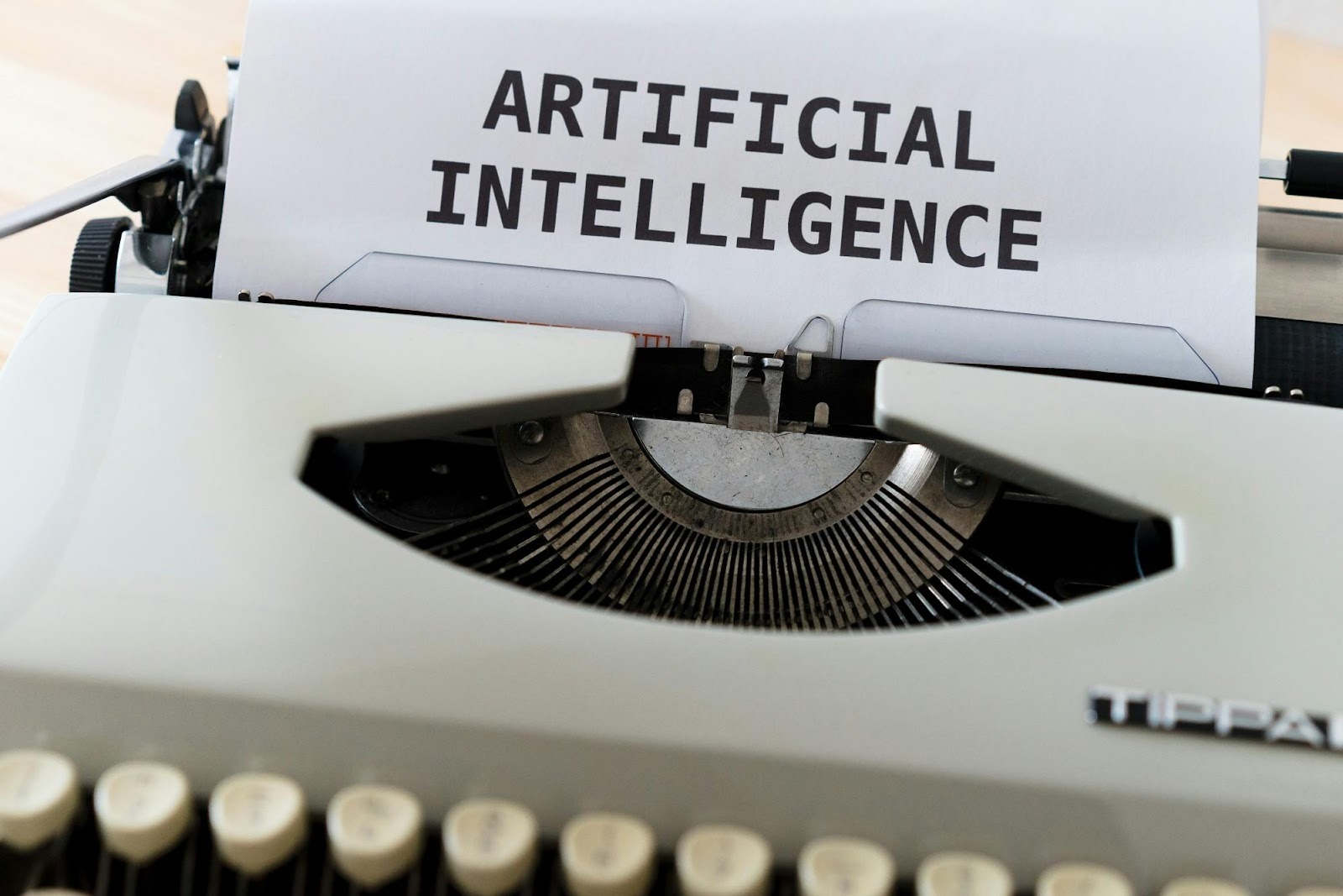 Retro typewriter typing "Artificial Intelligence," symbolizing the blend of traditional content creation with modern AI marketing tools.