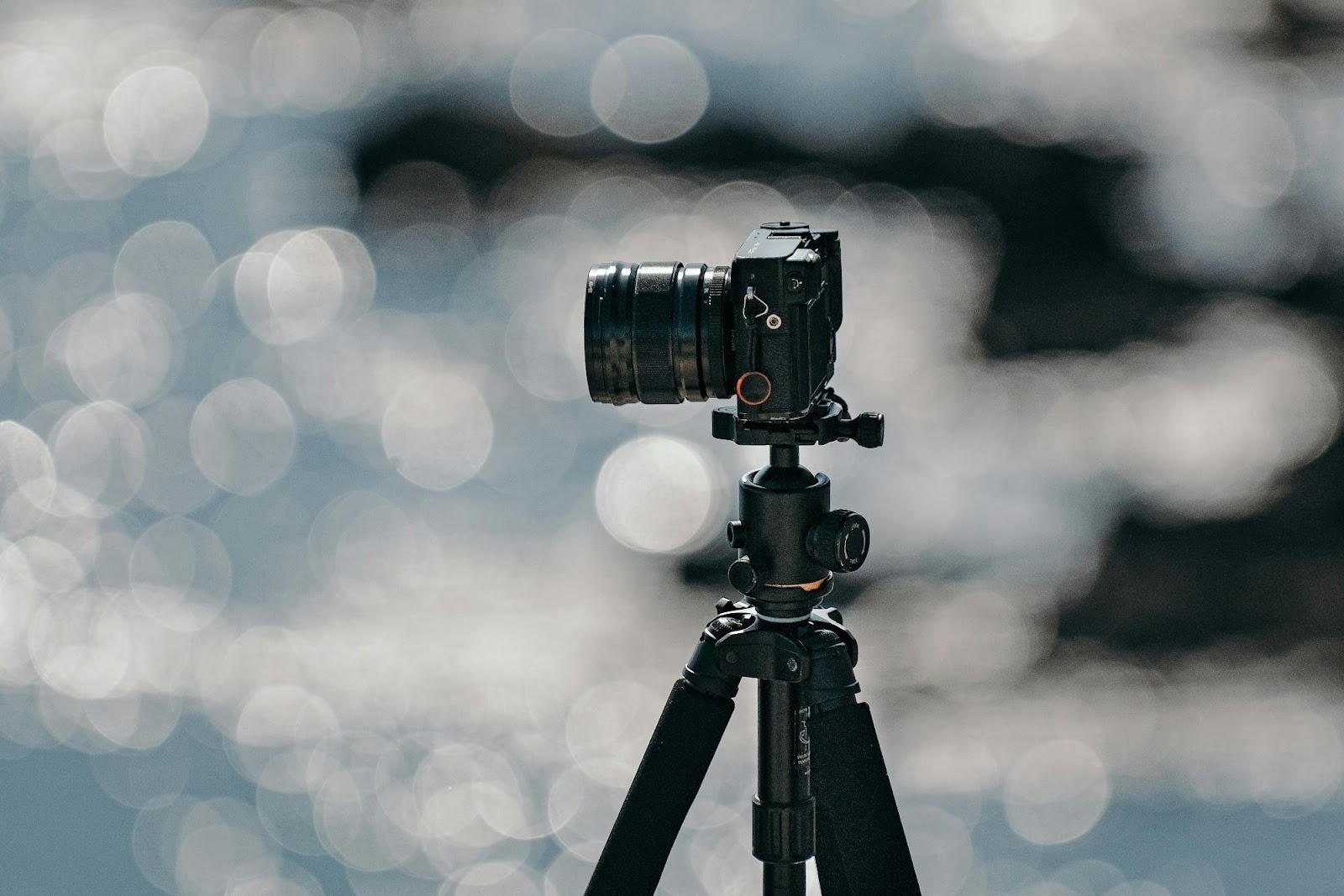 Professional camera on a tripod, highlighting the importance of high-quality photography and visual storytelling in content strategy.